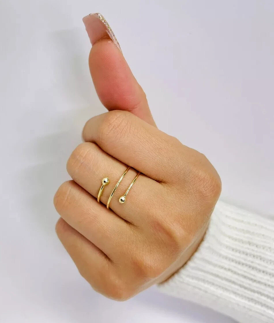 Spiral clearance ring gold