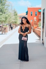 Elegant Black Long Gown Fits Small/Medium Excellent condition. Slightly worn