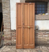 porta portone di ingresso a due ante bugnate in legno massello classico