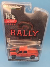 1:64 Greenlight 2015 Chevy Silverado Rally 2 Edition Orange Lifted