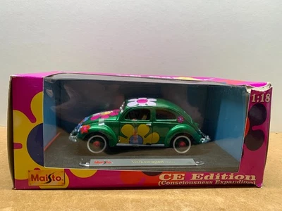 MAISTO VOLKSWAGEN NEW BEETLE FLEURS 1951  1/18 EN BOITE gé C10 - Photo 1/4