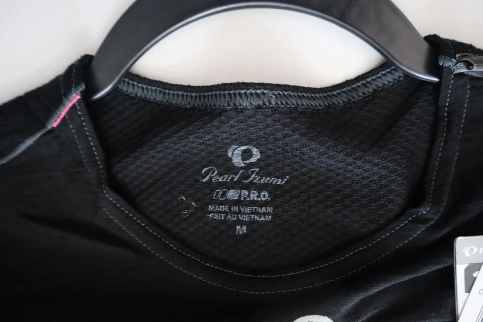 Camisa capa base de ciclismo Pearl Izumi para mujer talla M negra de lana de transferencia S/S $80 Foto 3 de 4