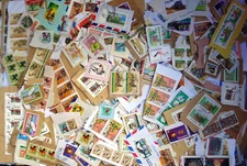 TANZANIA on paper mixture / kiloware 1 oz. (28 grams) L1