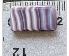 5103 quahog wampum bead. 18x10mm. 2 Holes Rectangle.
