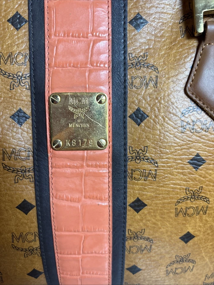 This is an MCM Visetos monogram tote bag with leather trim and a central stripe. - Image 2 of 4