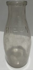 Vintage  Rieck Dairy Embossed Quart Milk Bottle