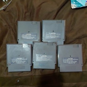  Lotto giochi NES -Le avventure di LOLO, Rush N Attack, Top Gun, NFL, ecc.