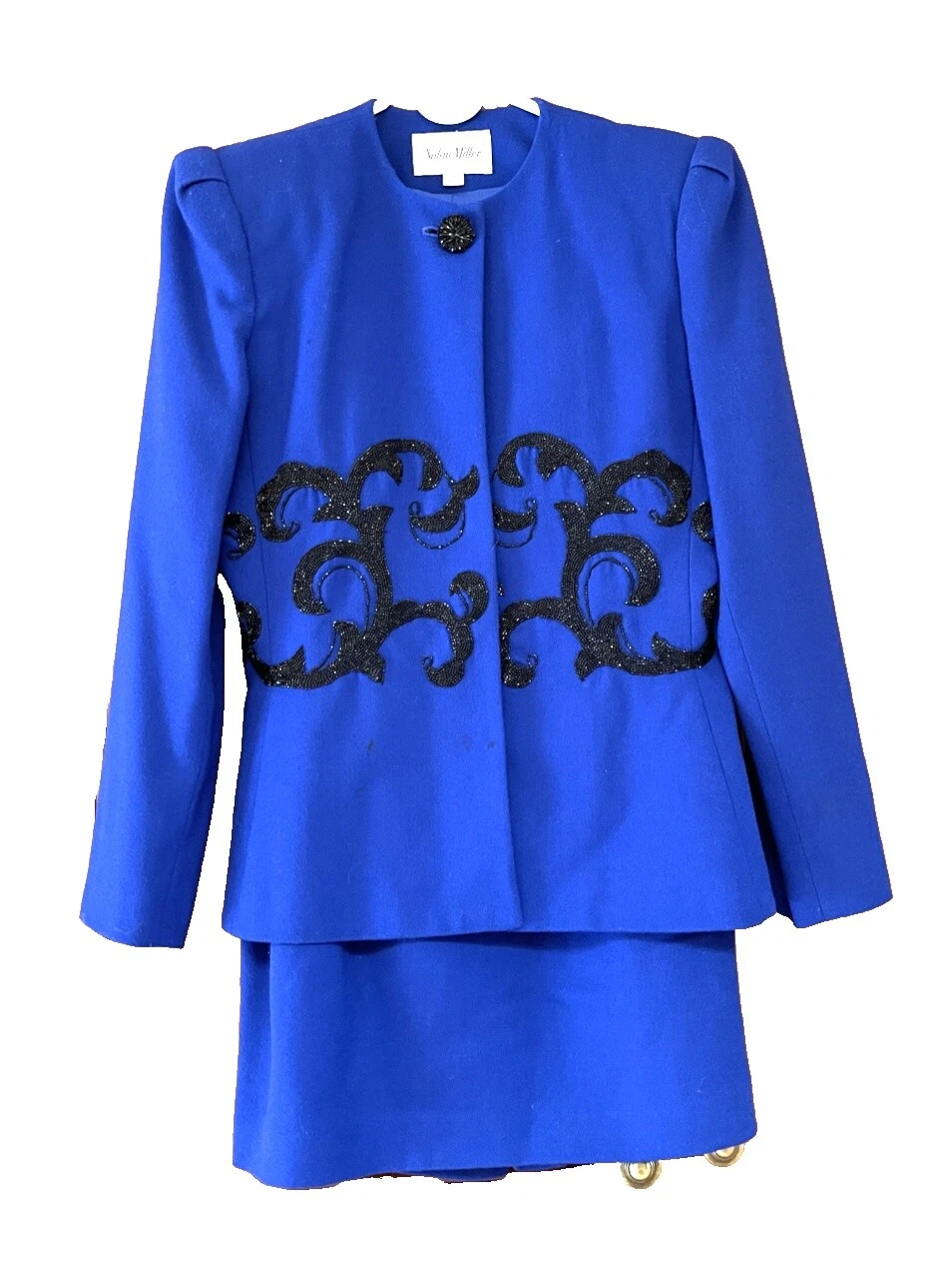 Nolan Miller Ropa, Calzado y Accesorios