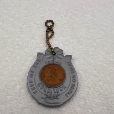 Encased Penny Keep Me and Never Go Broke keychain Schenley Whiskey