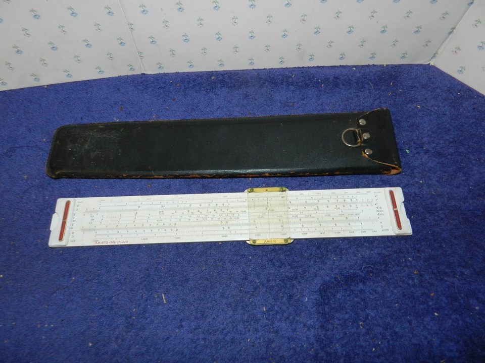 A German-made Aristo Multilog slide rule — West German engineering precision in a pocket-sized instrument that predates every calculator you've ever owned.