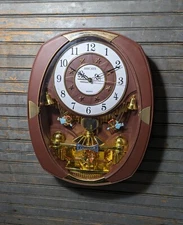 Read: RARE Vintage Aricays Romanza Musical Quartz Wall Clock Angels Cupid