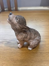 Small howling wolf cub - home and garden ornament