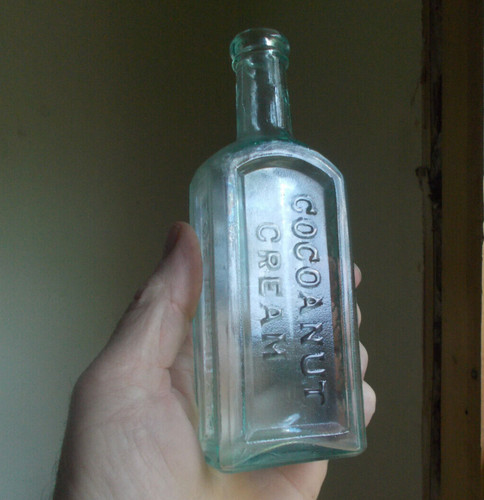 1870s W.G.CURRIER'S COCOANUT CREAM FOR THE HAIR SCARCE PANELED HAIR OIL BOTTLE
