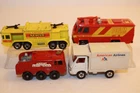 Four (4) Vintage 1960's-1980's Tomica / Matchbox / Hot Wheels Airport Trucks