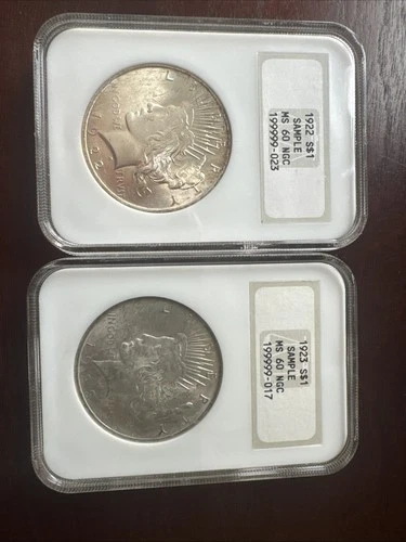 Two Peace Silver Dollars NGC MS 1922 and 1923