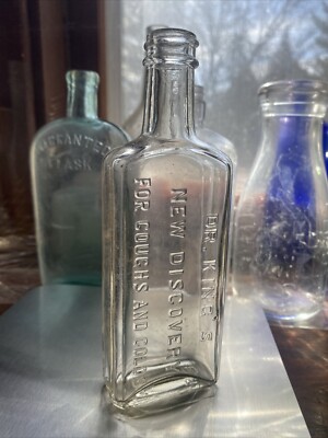 Antique Bottle Dr. King s New Discovery For Cough& Colds. Embossed. 6 1/2  Tall