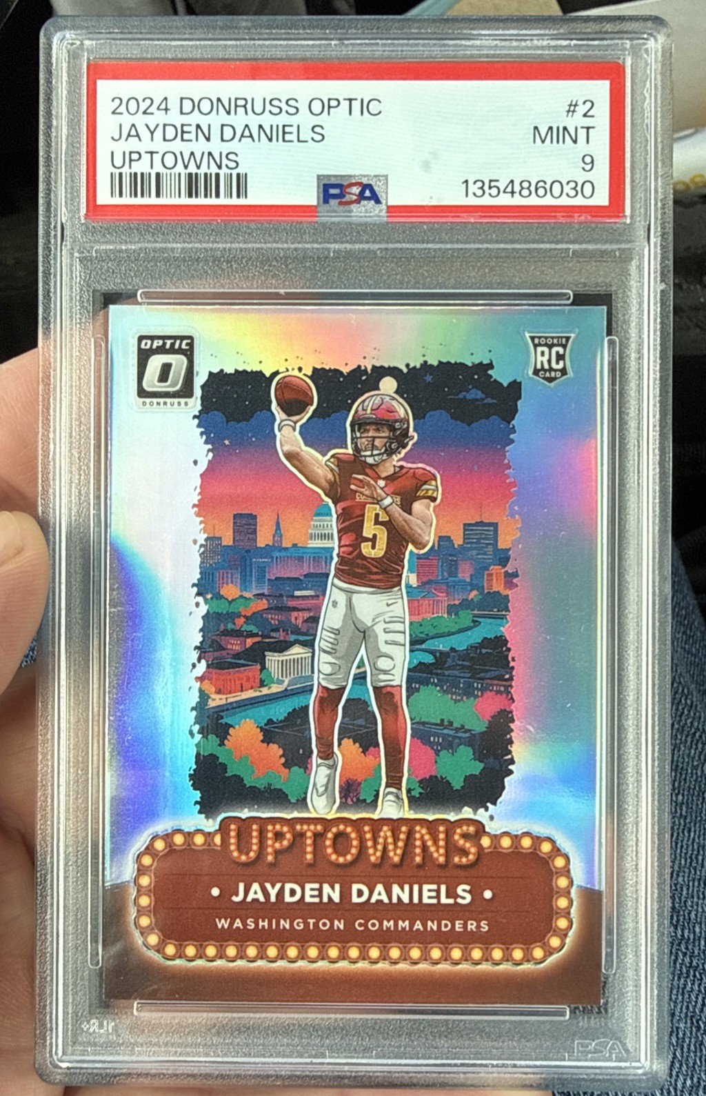 Panini 2024 Donruss Optic Uptowns Jayden Daniels RC #2 PSA 9 Commanders view 1