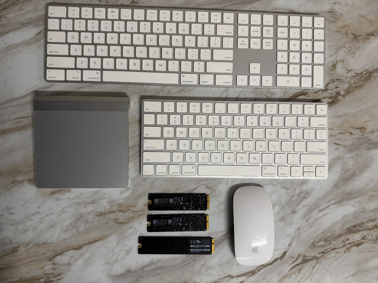 Assorted Apple Accessories Keyboards, Mouse, Trackpad and Storages Lot of 7