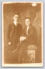 RPPC Postcard Portrait Real Photo Vtg azo 2 men brothers? dapper down smile