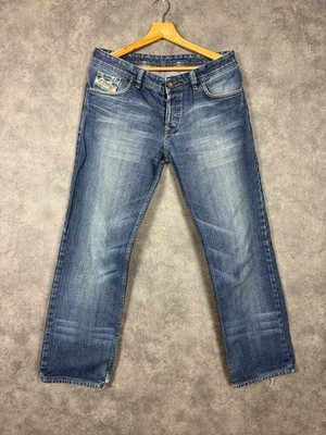 Diesel Industries denim jeans light blue classic wide fit with distressed detail