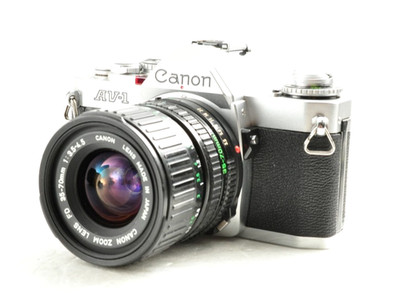 Near mint CANON AV-1 av-1 silver w/NFD 50mm Lens 35-70mm 1:3 SLR CAMERA tested