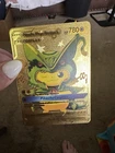 Gold foil collectible card featuring Pikachu dressed as Mega Rayquaza