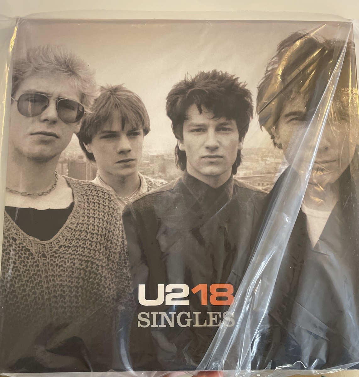 U2: 18 Singles Limited Edition Double LP Neon Orange Vinyl SHIPS