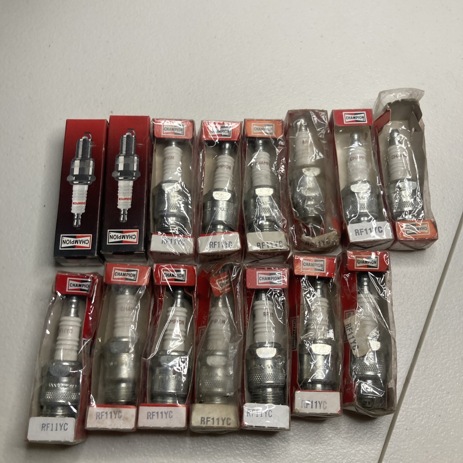 Champion spark plugs RF11YC, NEW. Lot Of 15. Some Packaging Is Open.
