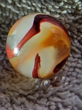 "Golden Onyx Oxblood" .71 Shiney wet dead mint. Very old, rare marble. 1920s 2