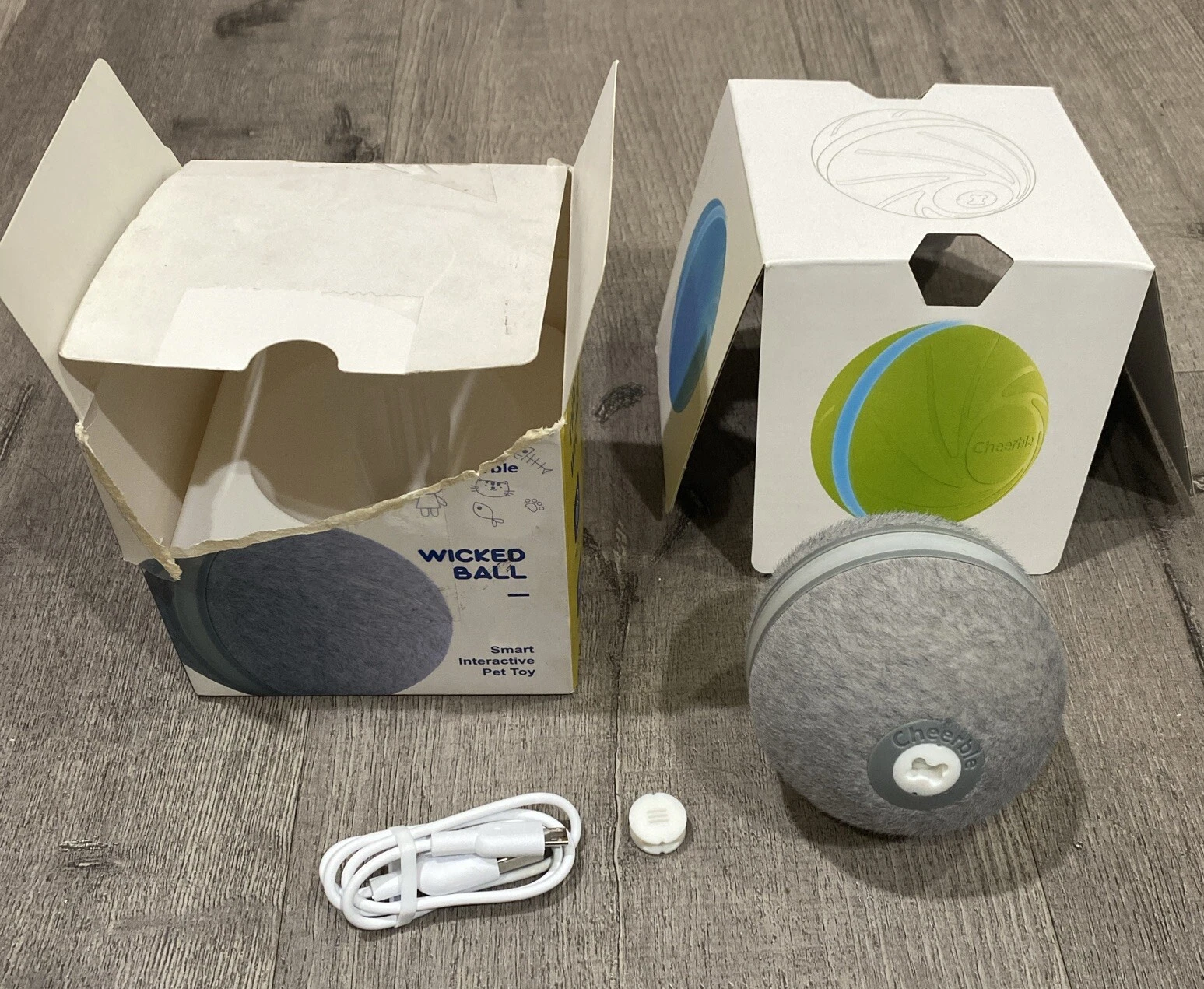 Cheerble Wicked Ball By Pet Joy In a wool covered ball - New Opened Box