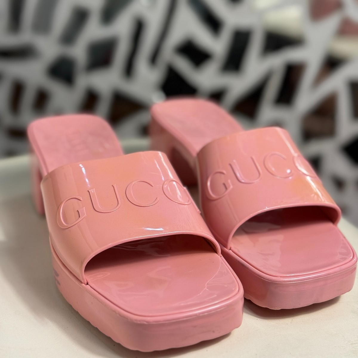 Gucci pink rubber embossed logo block heel slide sandals for