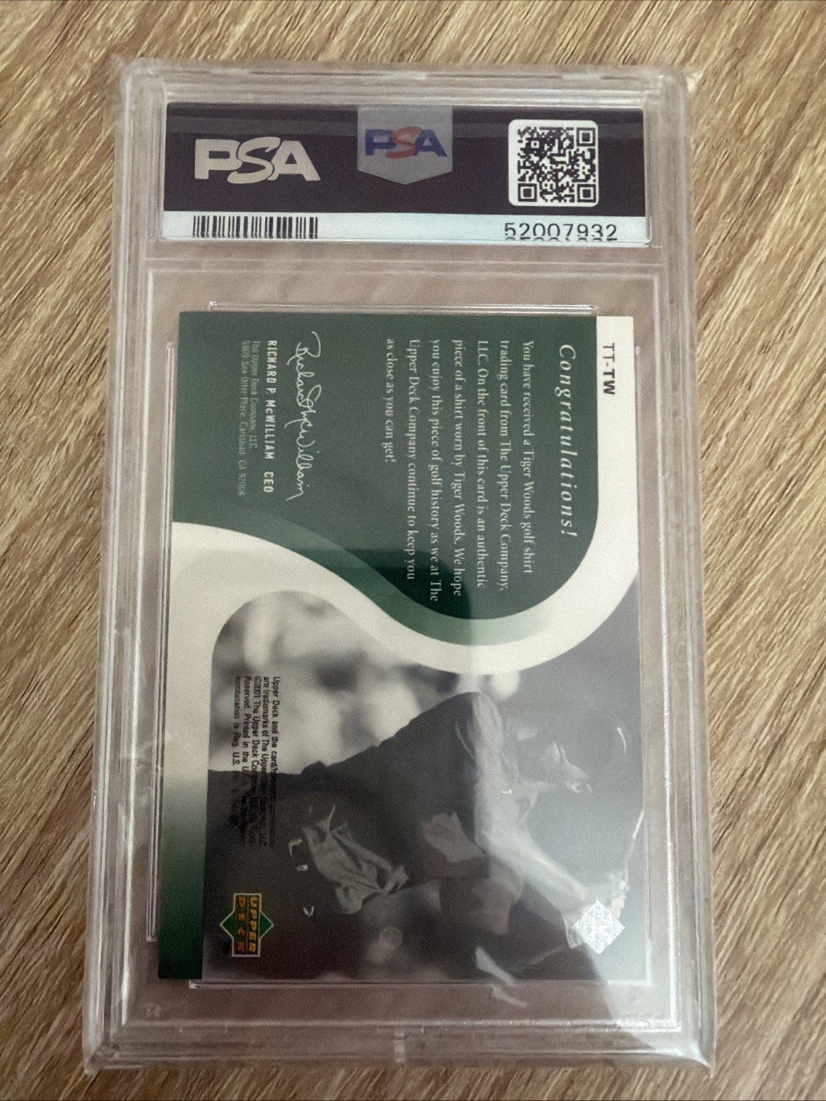 2001 Upper Deck Golf Tiger Woods Tour Threads White Shirt PSA 8 view 2