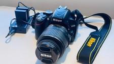 Nikon D D5100 16.2MP Digital SLR Camera - Black (Kit with VR 18-55 mm Lens)