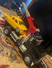 Mix lot of 2 Driven by battat Tow Truck lights and sounds with Yellow Truck