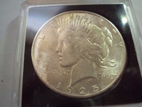1925 s au + peace silver dollar some light tonning