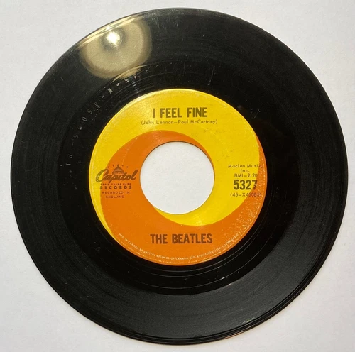 The Beatles, I Feel Fine / She's a Woman, vinyl 45 (Canada Capitol, 1964)