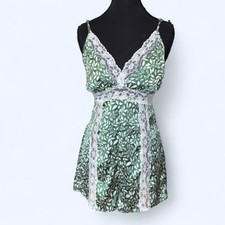 Lace trim floral romper by Anthropologie Soft satin-feel fabric