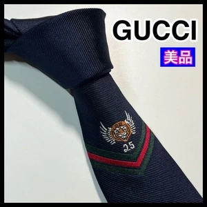 Magnifique cravate GUCCI 2,75 pouces soie sherry tigre marine