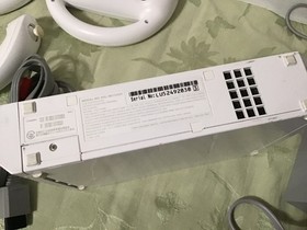 Wii nintendo console & accessories, remote, wheels, nunchuck, power cord,, works