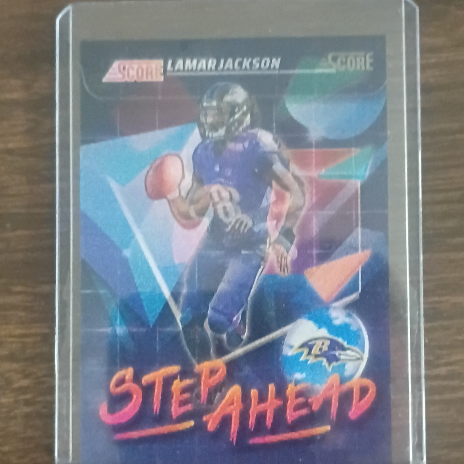 Case Hit 2025 Panini Score Football  Lamar Jackson Step Ahead Insert Ravens