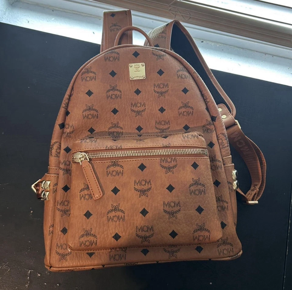 Mochila MCM de cuero negro/marrón talla mediana  Foto 2 de 4