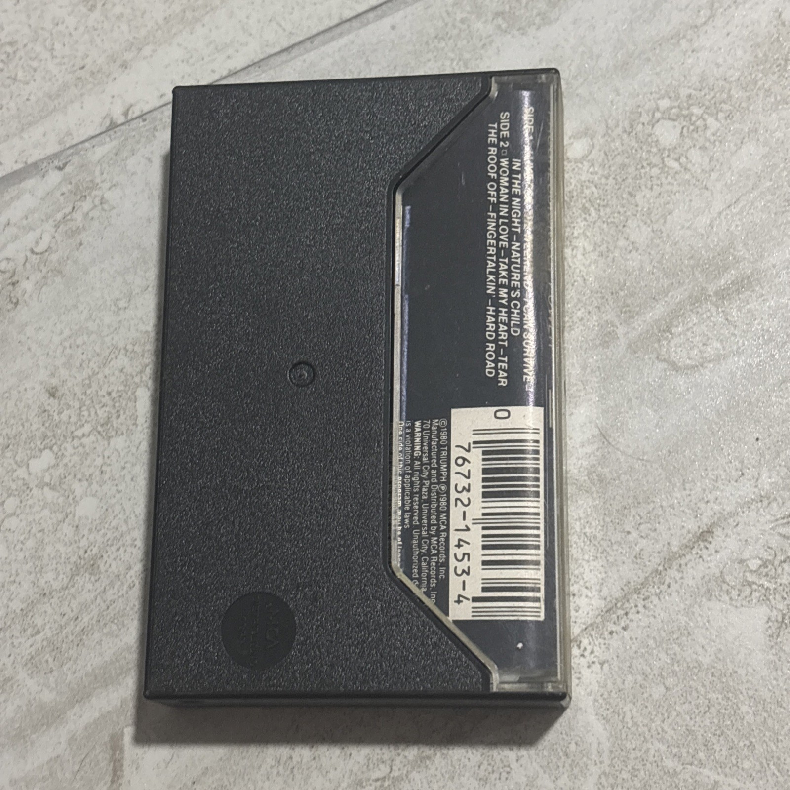 TRIUMPH "PROGRESSIONS OF POWER" CASSETTE TAPE