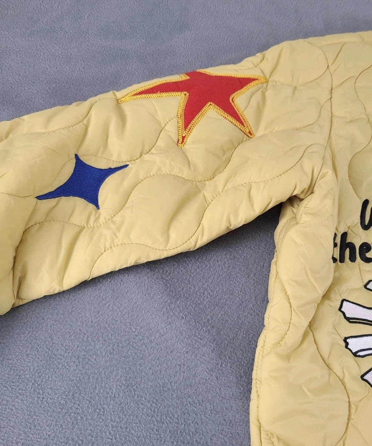 NWT Unisex SMALL First Row Quilted Jacket Yellow Melting Earth Graphic Bomber - product detail image 11