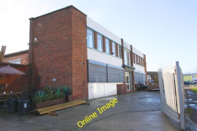 Photo 6x4 A&E Leisure Ltd, Cradock Road Reading There is an OS benchmark  c2014