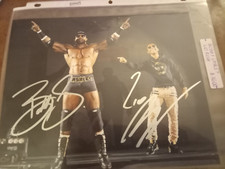Bobby Lashley & Lio Rush WWE Autographed 8x10 Photo  - No C O A