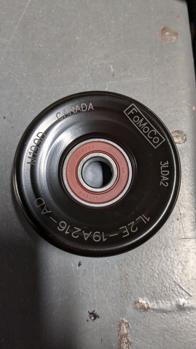 Genuine Accessory Drive Belt Idler Pulley 1L2Z-8678-AD