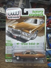 AUTO WORLD 1976 Cadillac Coupe DeVille Firemist 1:64 Diecast Luxury Cruisers
