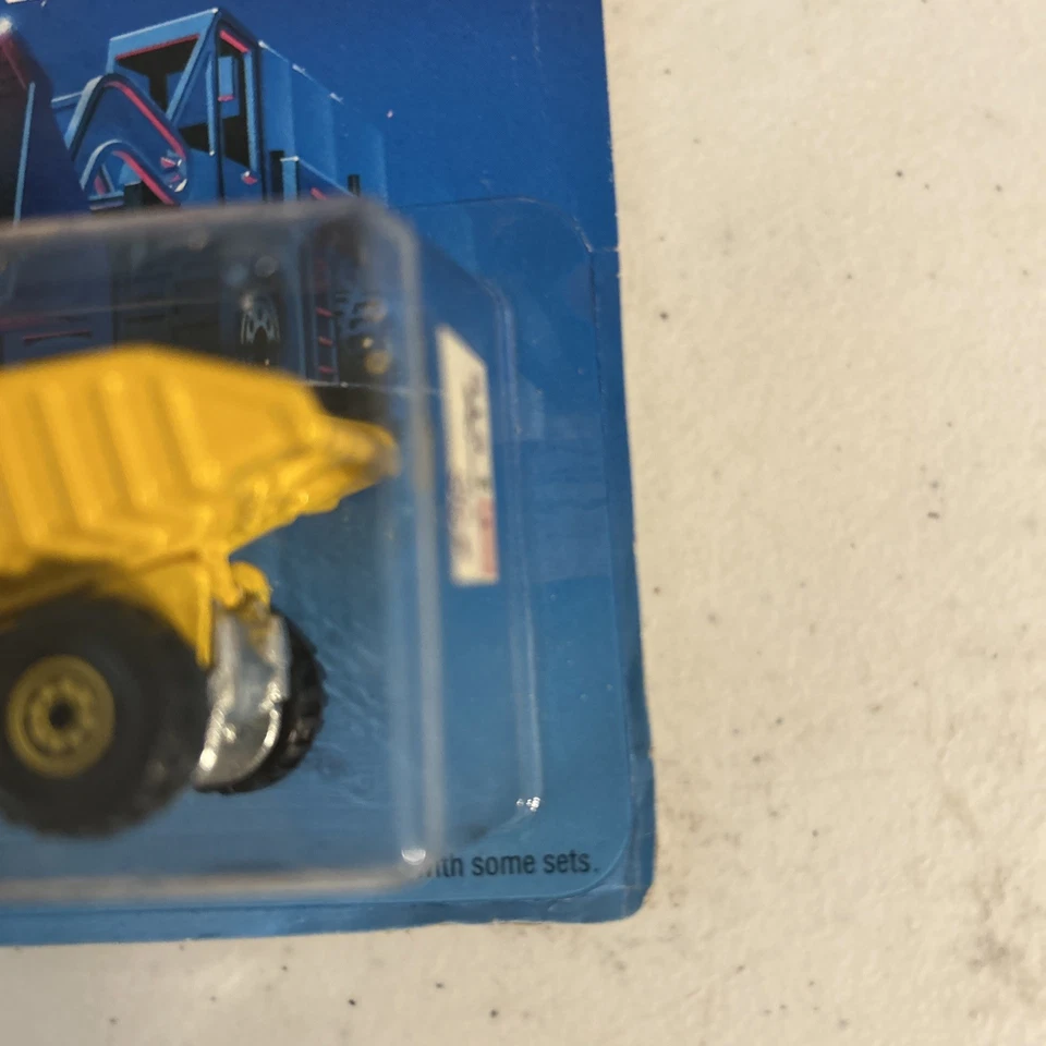 1987 Hot Wheels САМОСВАЛ CAT с ЗОЛОТЫМИ КОЛЕСАМИ РАБОЧИЕ ЛОШАДКИ НОВЫЙ В УПАКОВКЕ H463 - Изображение 3 из 4