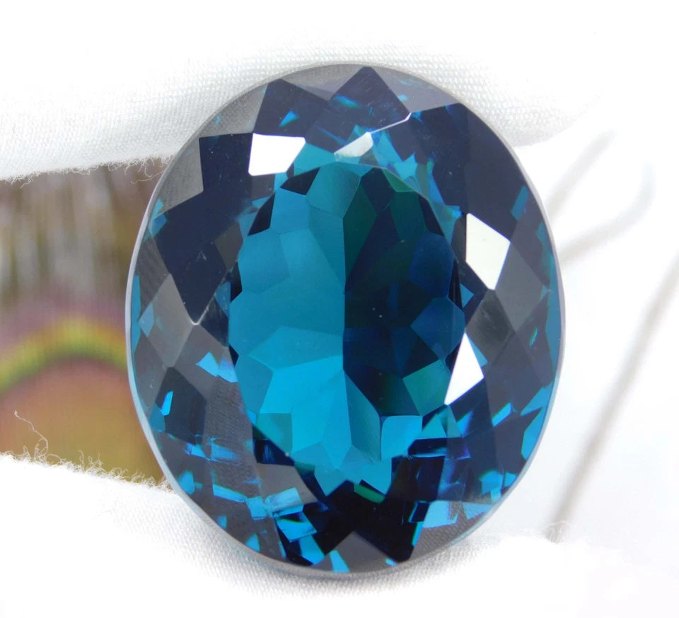 Piedra preciosa de corte ovalado granate tsavorita azul natural Kenia 128,90 quilates certificada Foto 4 de 4