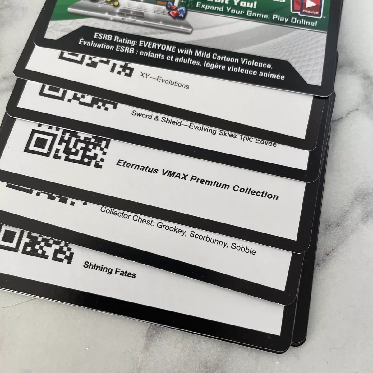 What's the difference between Black and White Redeem Code Cards? : r/ptcgo